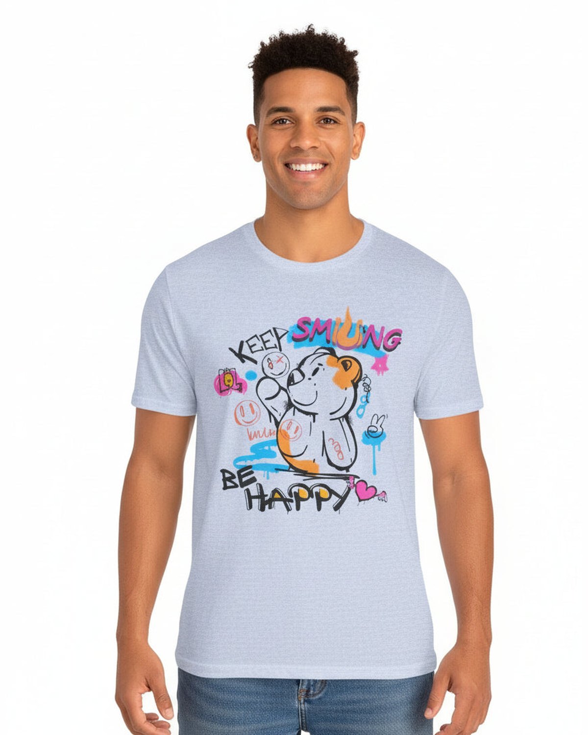 Person wearing a violet t-shirt with a colorful graphic design and a text Keep Smiling, Be Happy on a white background