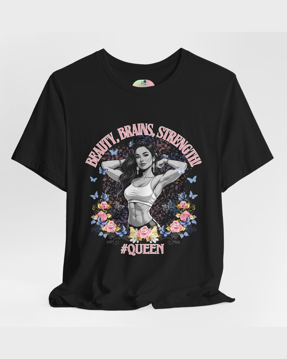 Black t-shirt with a graphic design of a fitness woman, flowers, butterflies and text 'Beauty, Brains, Strength #Queen' on a white background