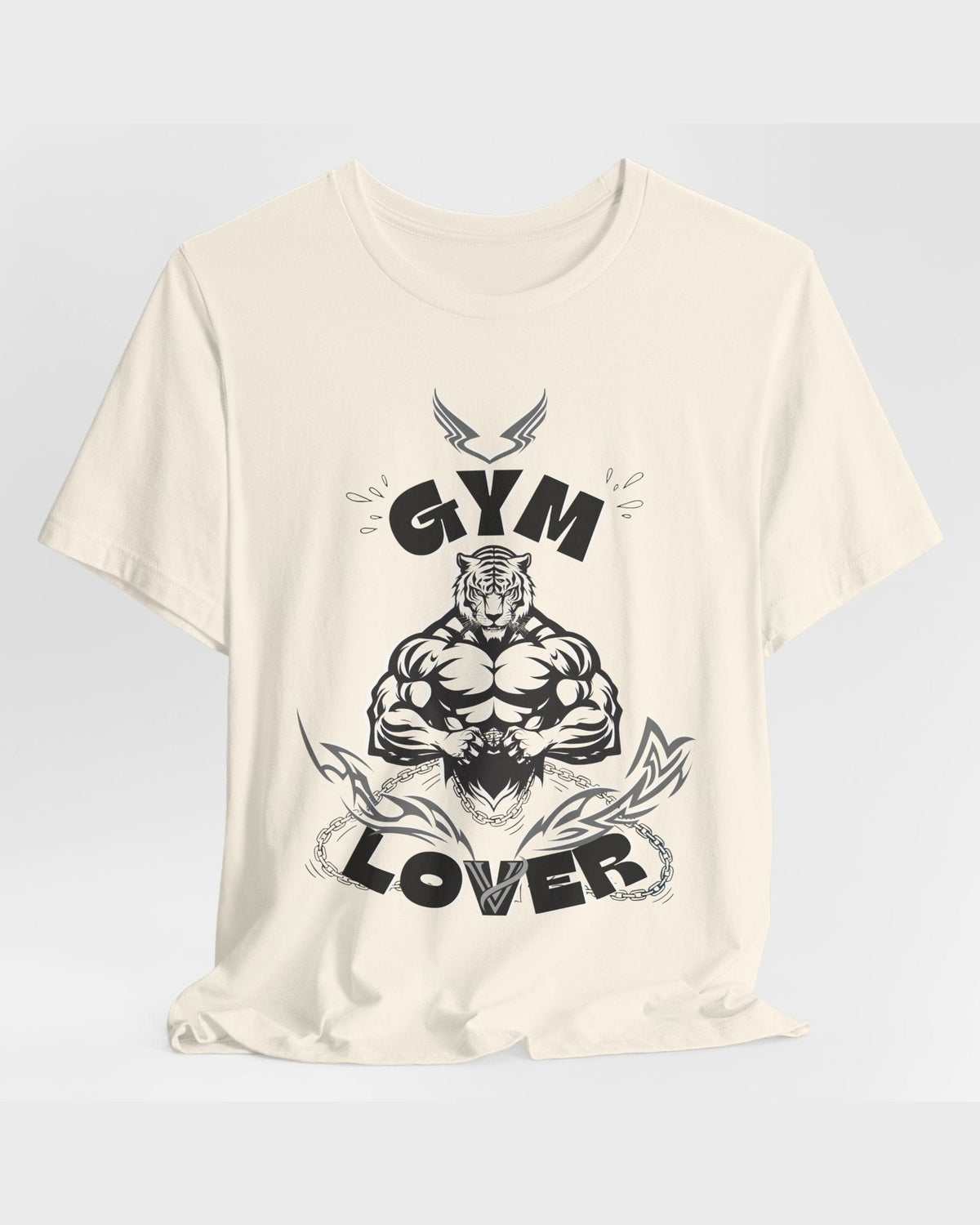 Beige t-shirt with black graphic design featuring a muscular tiger and 'Gym Lover' text on a white background.