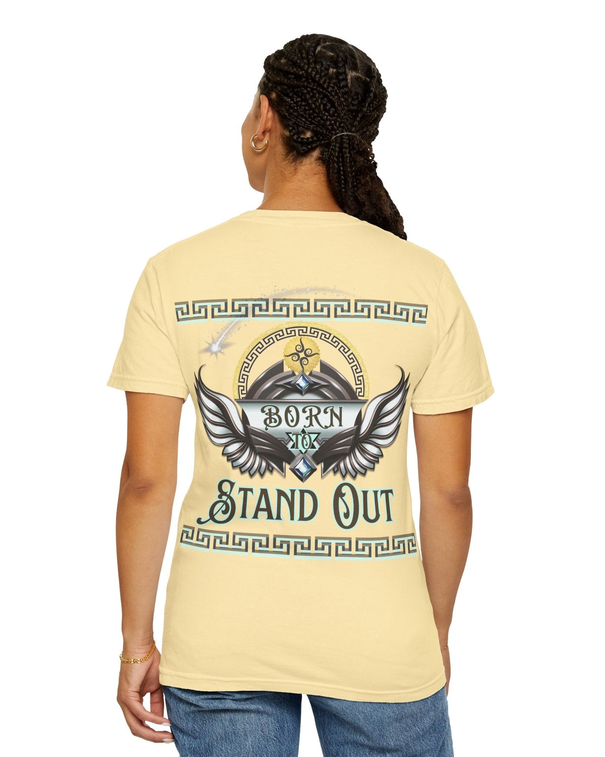 Person wearing a yellow t-shirt with a wings design and text Born to Stand Out on the back, on a white background