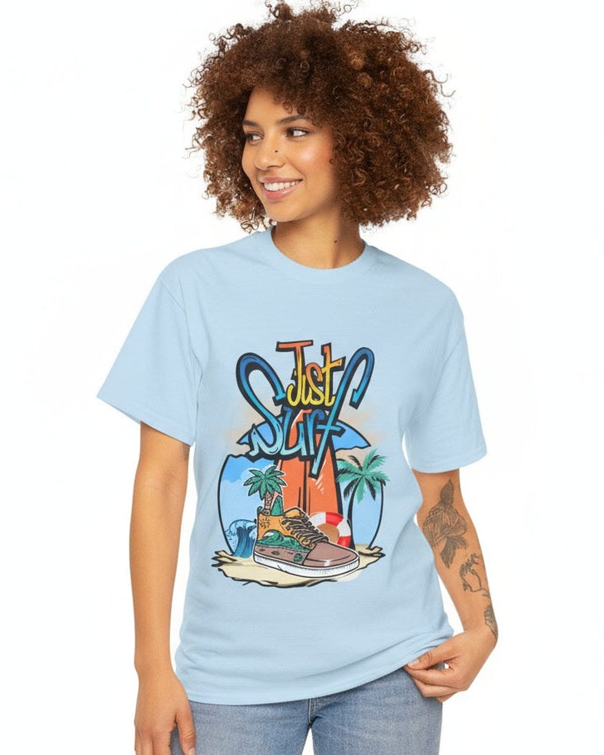 Woman wearing a light blue t-shirt with a 'Just Surf' graphic design on a white background