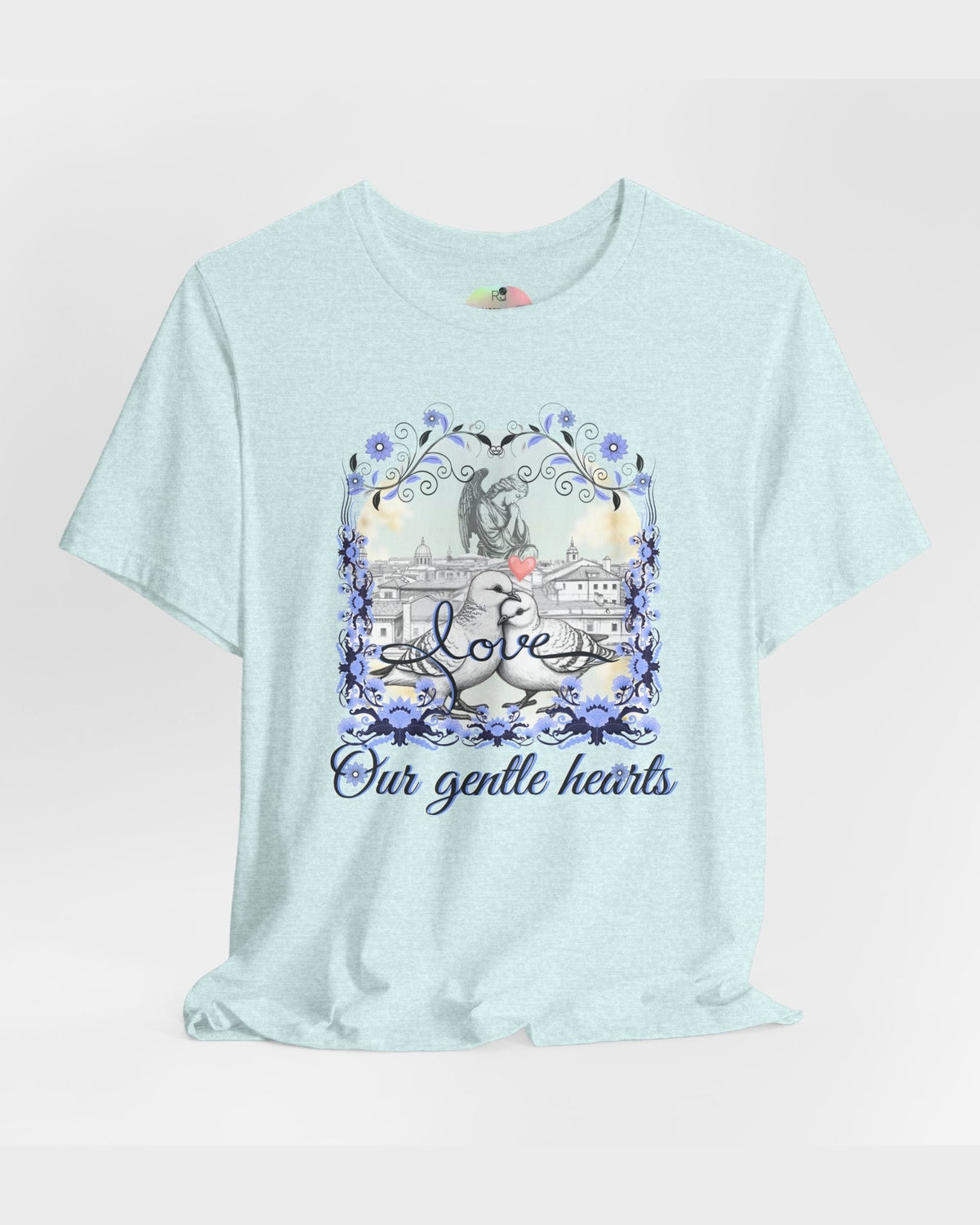 Light blue t-shirt with a dove graphic design and text on a light gray background