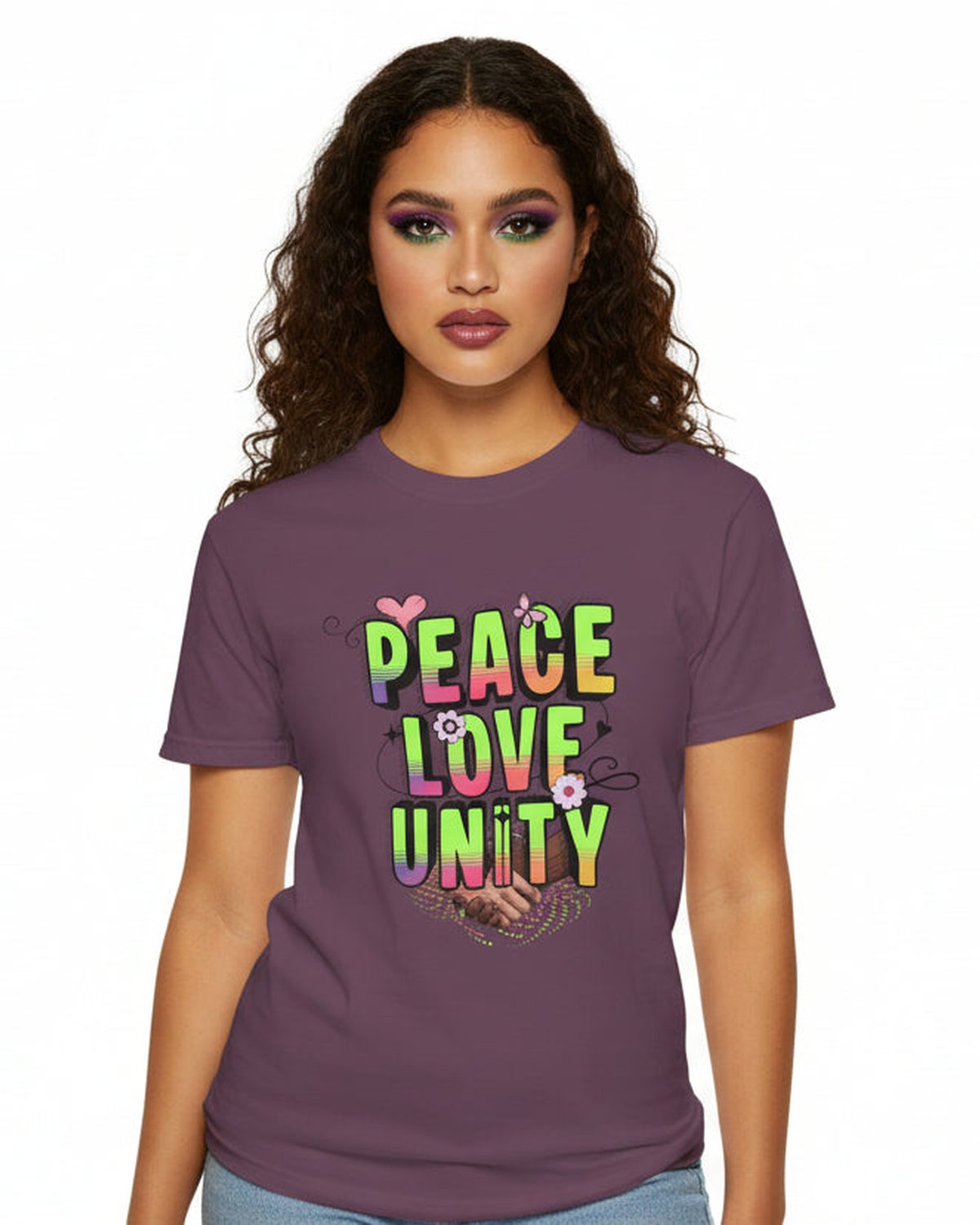 Woman wearing a purple t-shirt with 'Peace Love Unity' text and design.