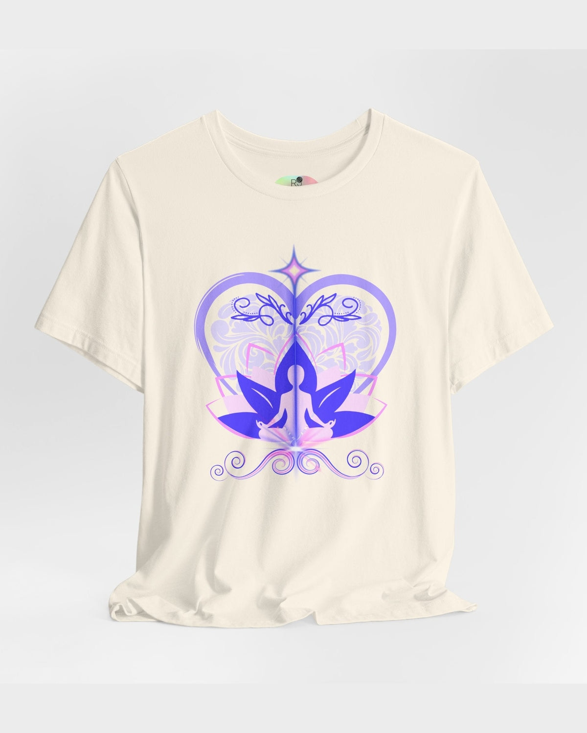 Soft yellow t-shirt with a purple and pink design of a meditating figure, heart and lotus on a light grey background