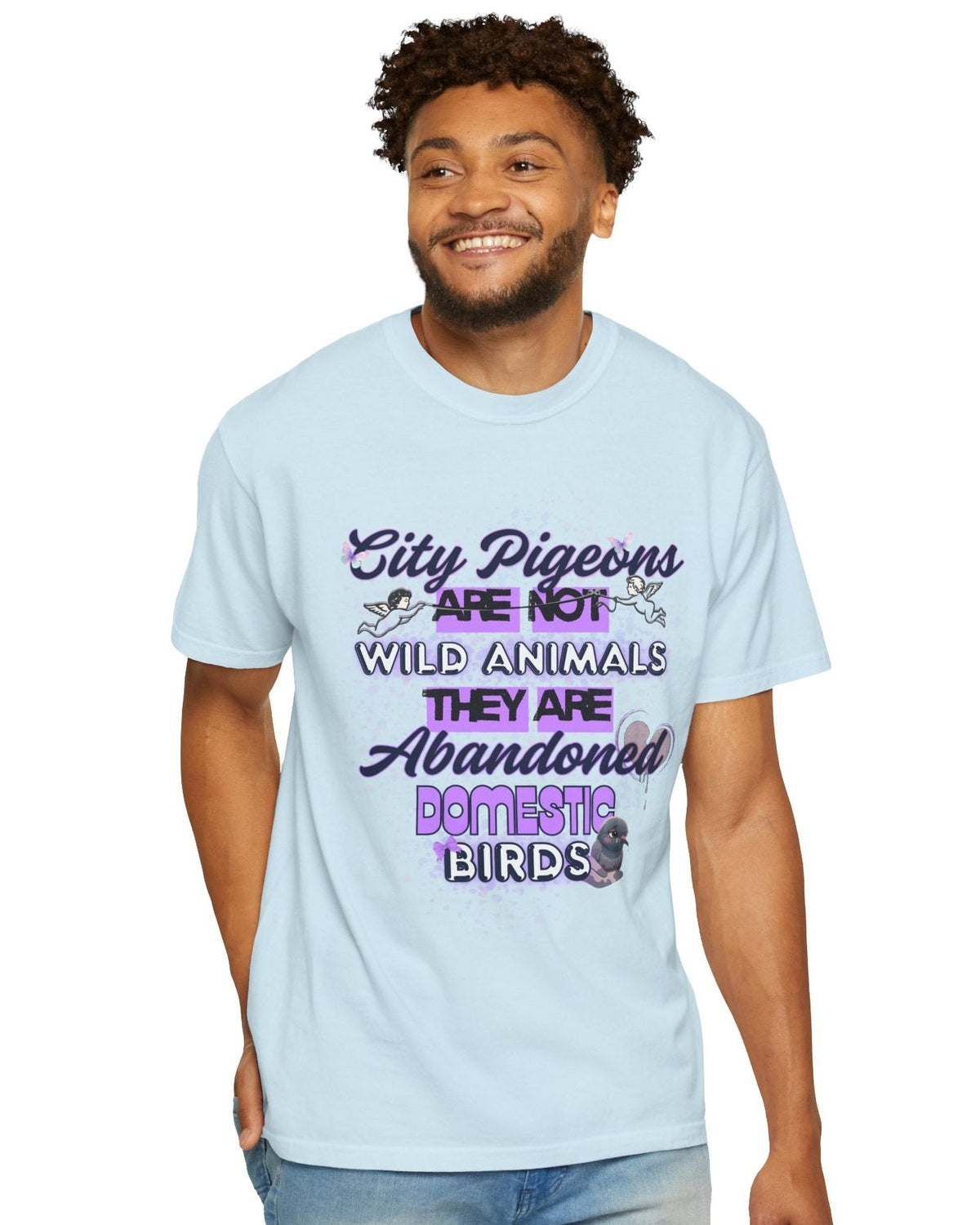 Man wearing a light blue t-shirt with a unique purple design and quote City Pigeons are not wild animals on a white background