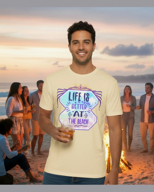 Person wearing a t-shirt with 'Life is better at the beach' on a beach with friends around a fire.