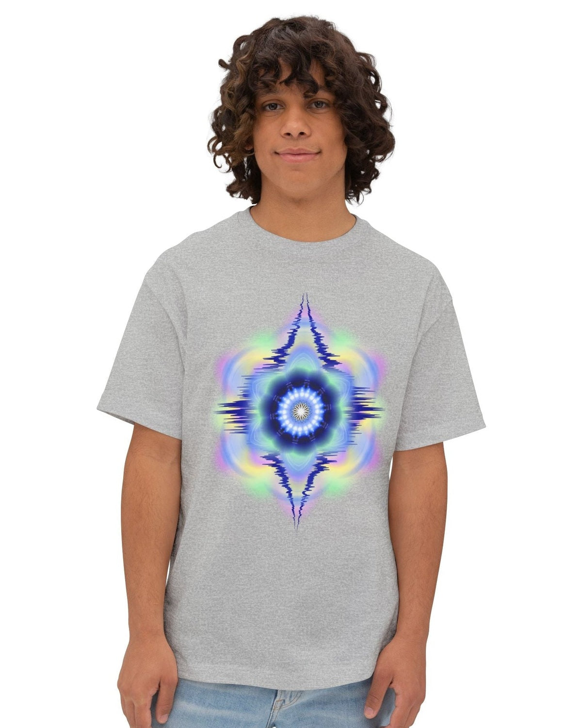 Person wearing a grey t-shirt with a vibrant hues geometric design on a white background