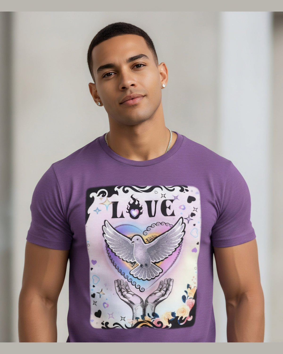 Man wearing a purple t-shirt with a graphic design featuring a dove and text Love on a grey background 