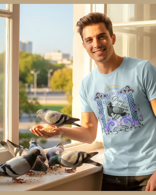 Man feeding pigeons by a window with a t-shirt featuring a dove design and a text Peace & Love.