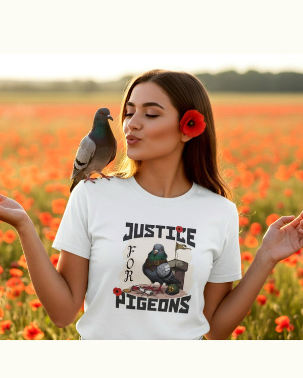 Woman wearing a t-shirt with a pigeon graphic and 'Justice for Pigeons' text in a field of red flowers.