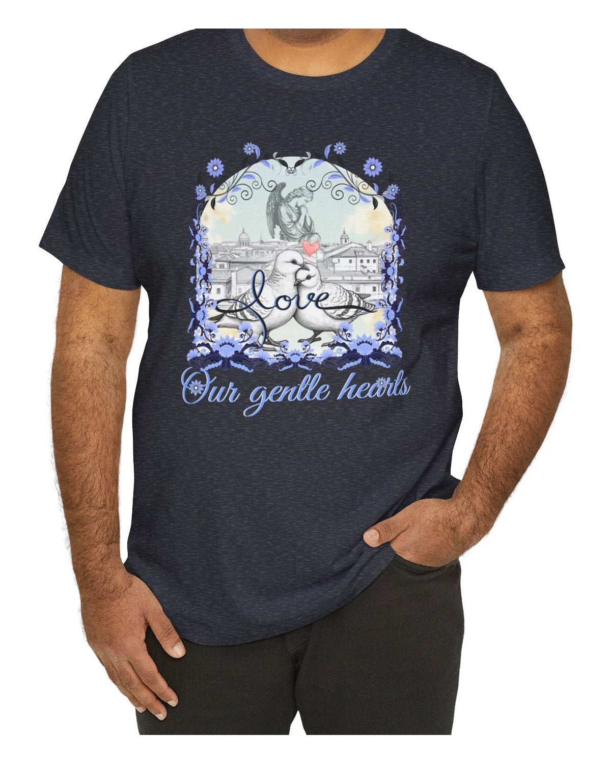 Person wearing a dark blue t-shirt with a graphic design and text Love our gentle hearts on a white background