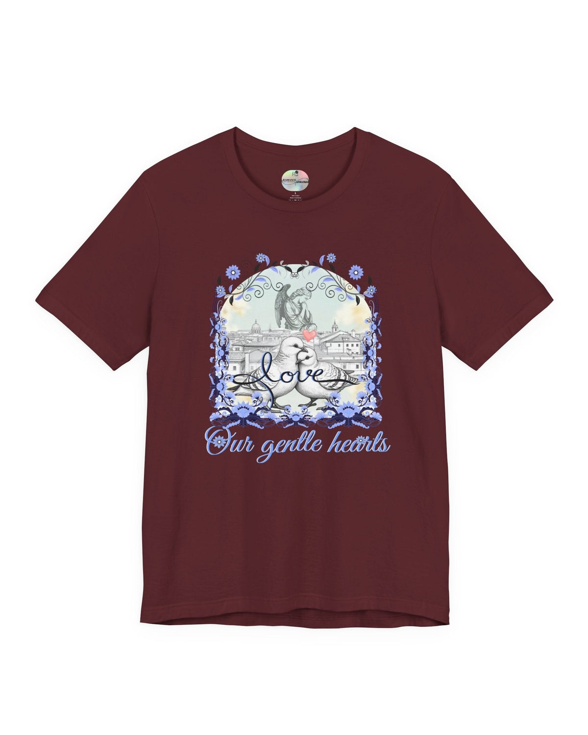 Maroon t-shirt with pigeons, angel and flowers graphic design and text on a white background
