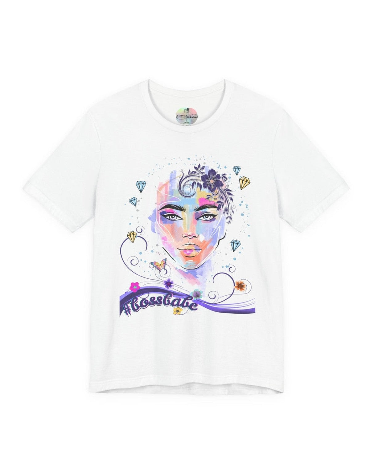 White t-shirt with a colorful graphic design of a female face, diamonds and flowers and a text #bossbabe on a white background