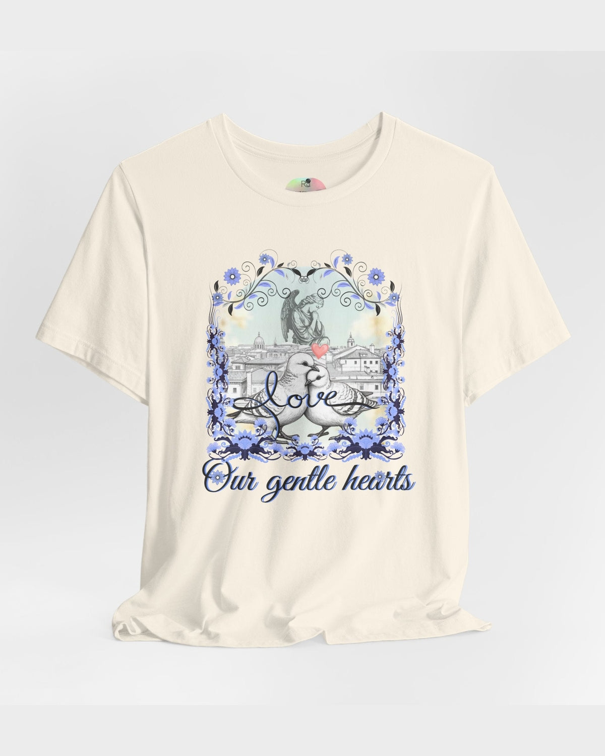 Soft yellow t-shirt with a graphic design featuring text and illustrations of pigeons and Angel on a white background