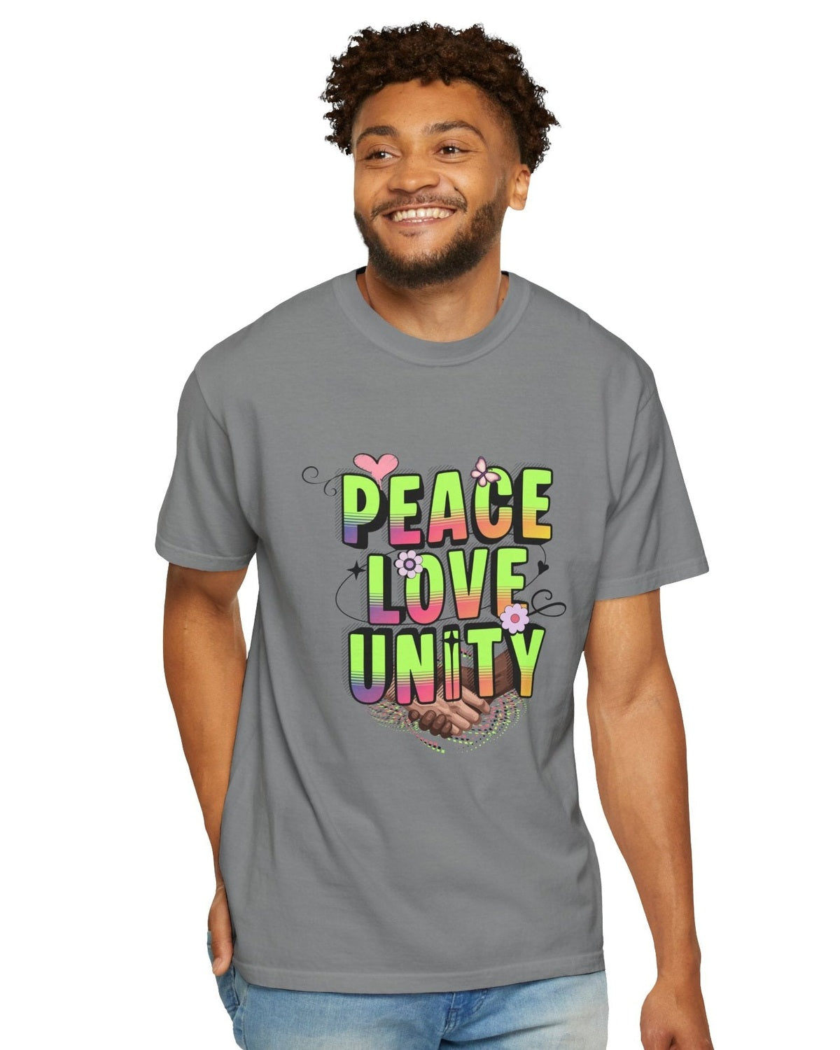 Man wearing a gray t-shirt with 'Peace Love Unity' design on a white background