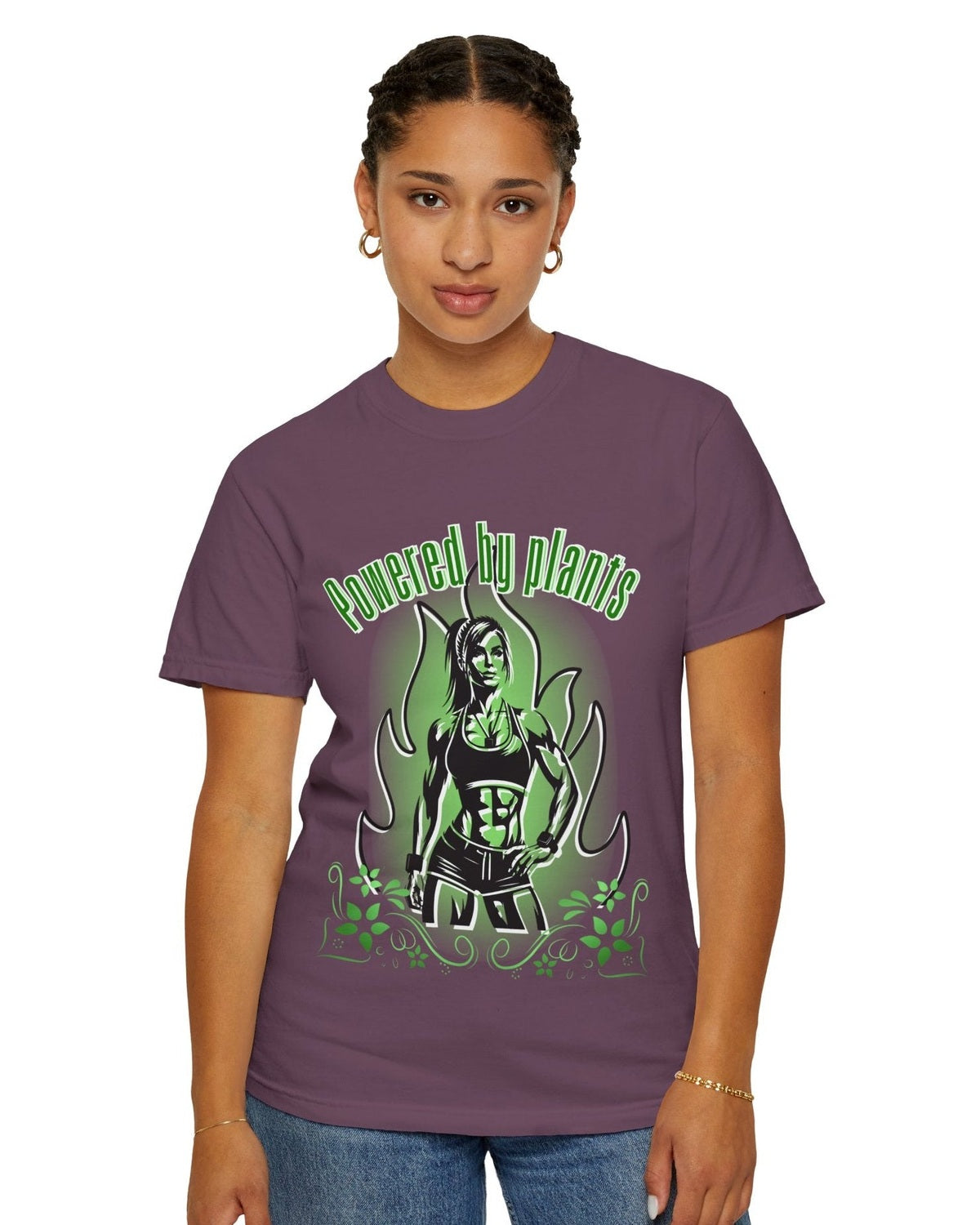 Person wearing a dark red t-shirt with a graphic design of a  fitness woman and text 'Powered by plants' on a white background