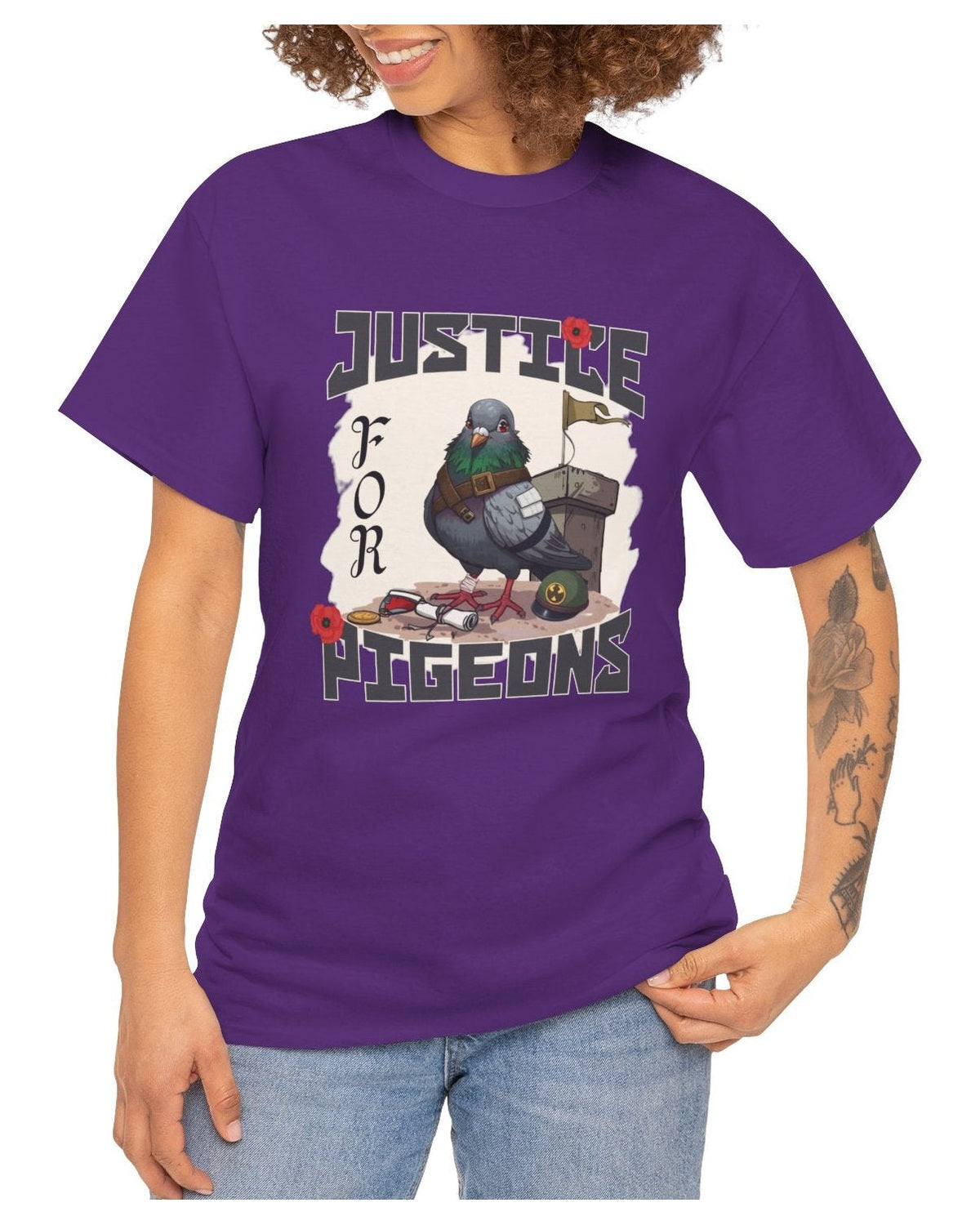 Person wearing a purple t-shirt with a graphic design of a pigeon and text 'Justice for Pigeons'.