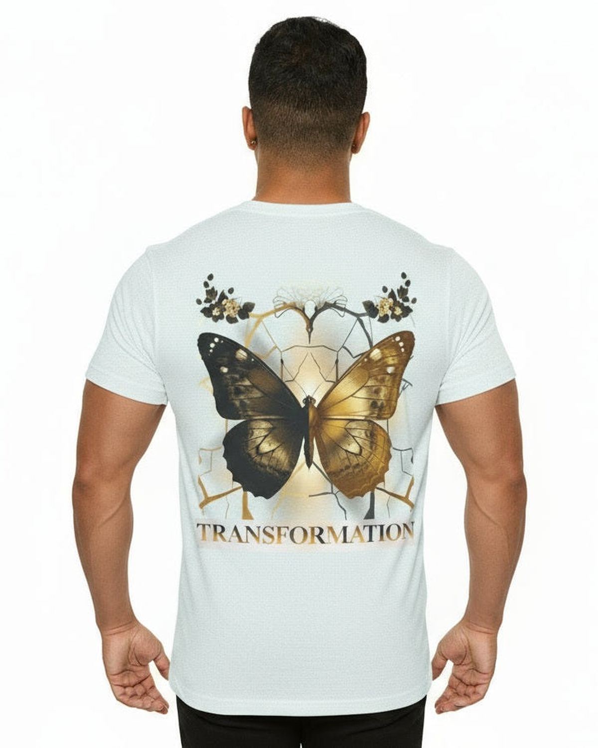 Person wearing a light blue t-shirt with a gold and brown contrast butterfly design and 'TRANSFORMATION' text on the back.