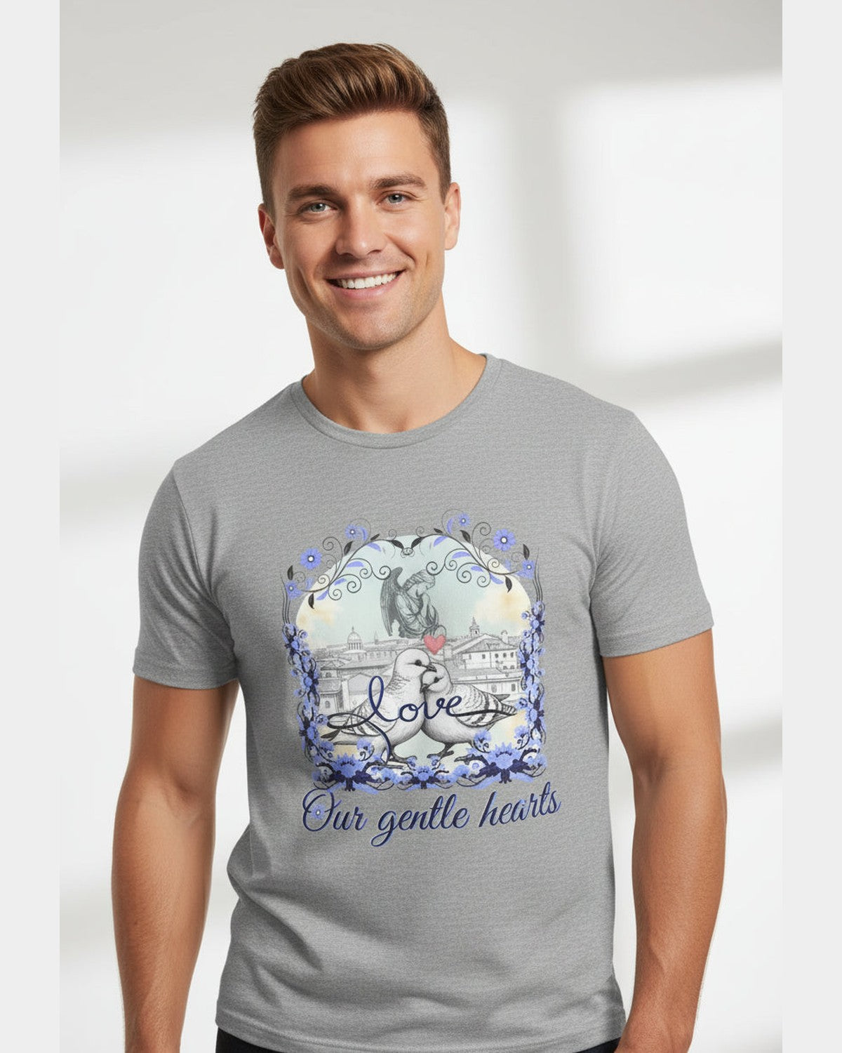 Man wearing a gray t-shirt with a dove graphic design and text on a light gray background