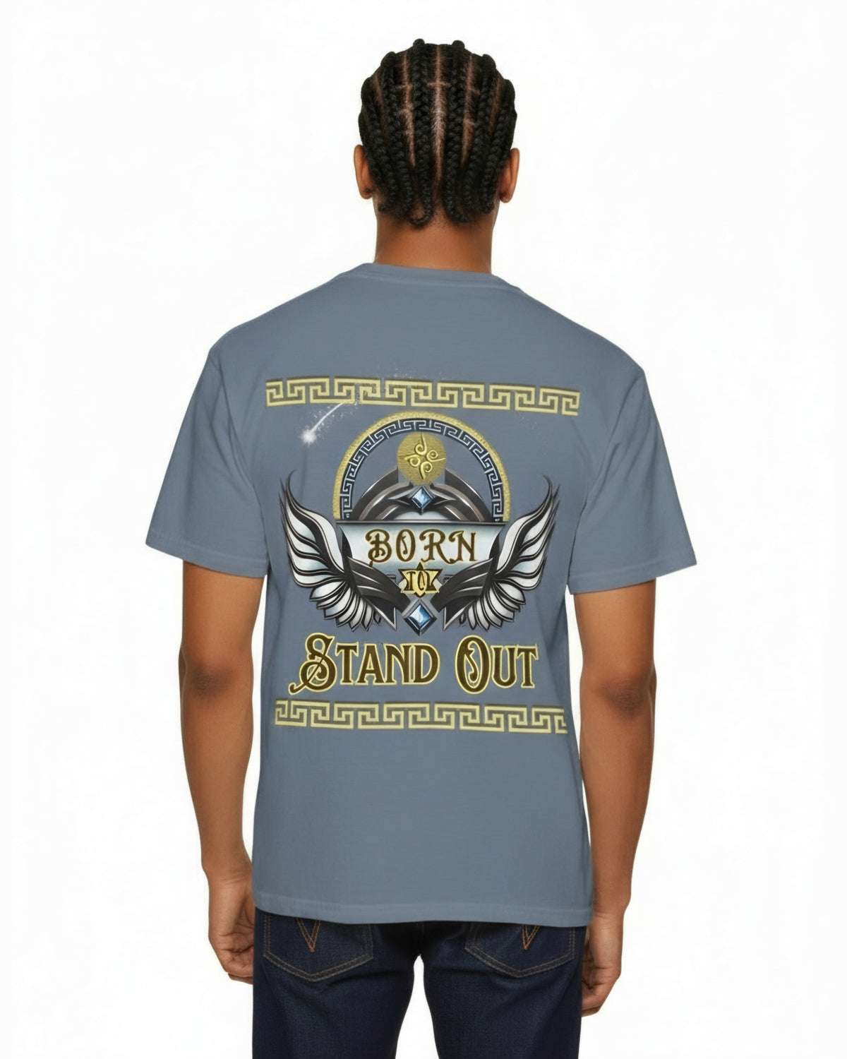 Person wearing a gray t-shirt with a winged design and a text Born to Stand Out on the back