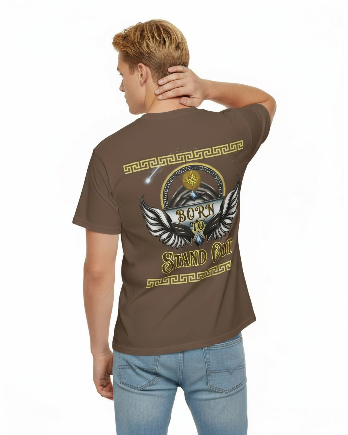 Man wearing a brown t-shirt with a winged graphic design on the back and a text Born to Stand Out, standing against a white background.