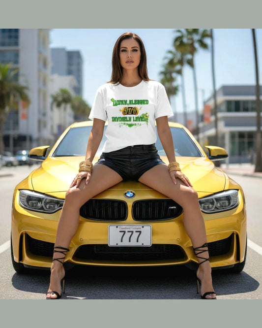A model sitting on a golden car wearing a white Tshirt with green design that says 'Lucky, Blessed, Divinely loved' 777